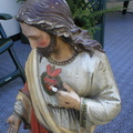 Restaurieren  einer Herz Jesu Statue. Die Statue ist  extrem beschädigt.  Bild 1 - 6
